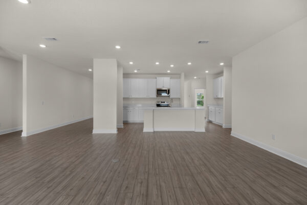 The open layout in the Walton floorplan from the Cornerstone Collection by Holiday Builders.