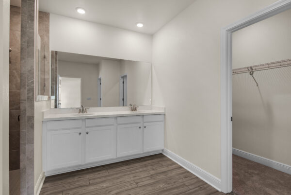 The owner's bath in the Walton floorplan from the Cornerstone Collection by Holiday Builders.