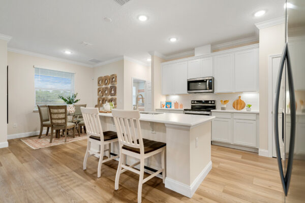 A new home by Holiday Builders focused on the kitchen.